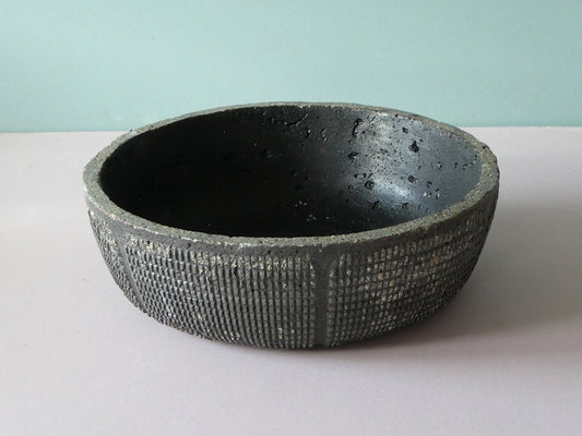 Handcrafted black concrete bowl