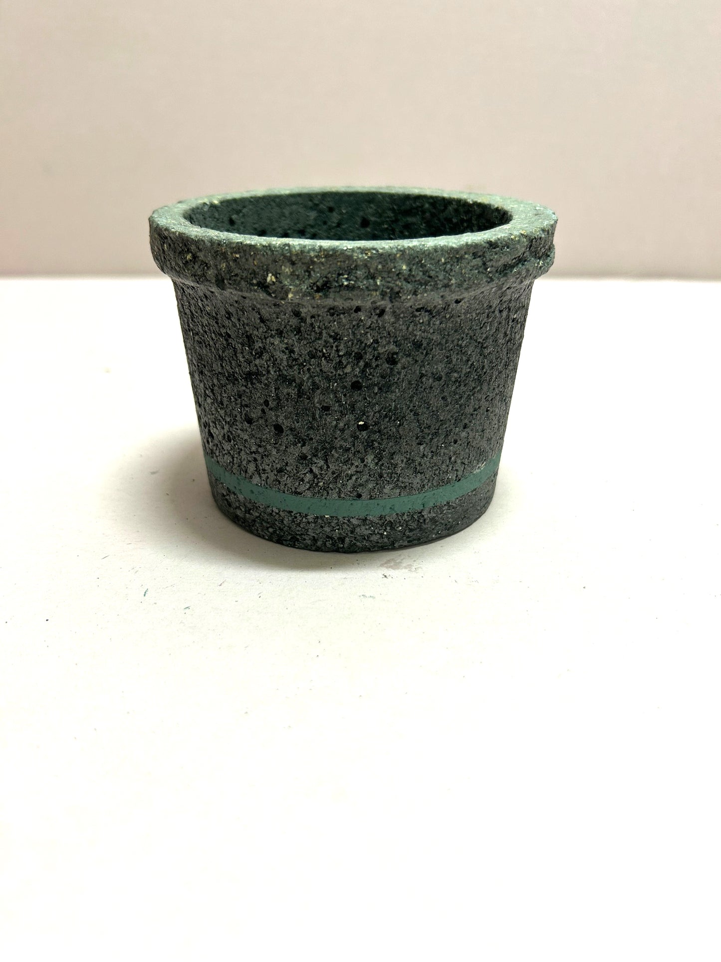 Black small concrete pot with livid coloured stripe