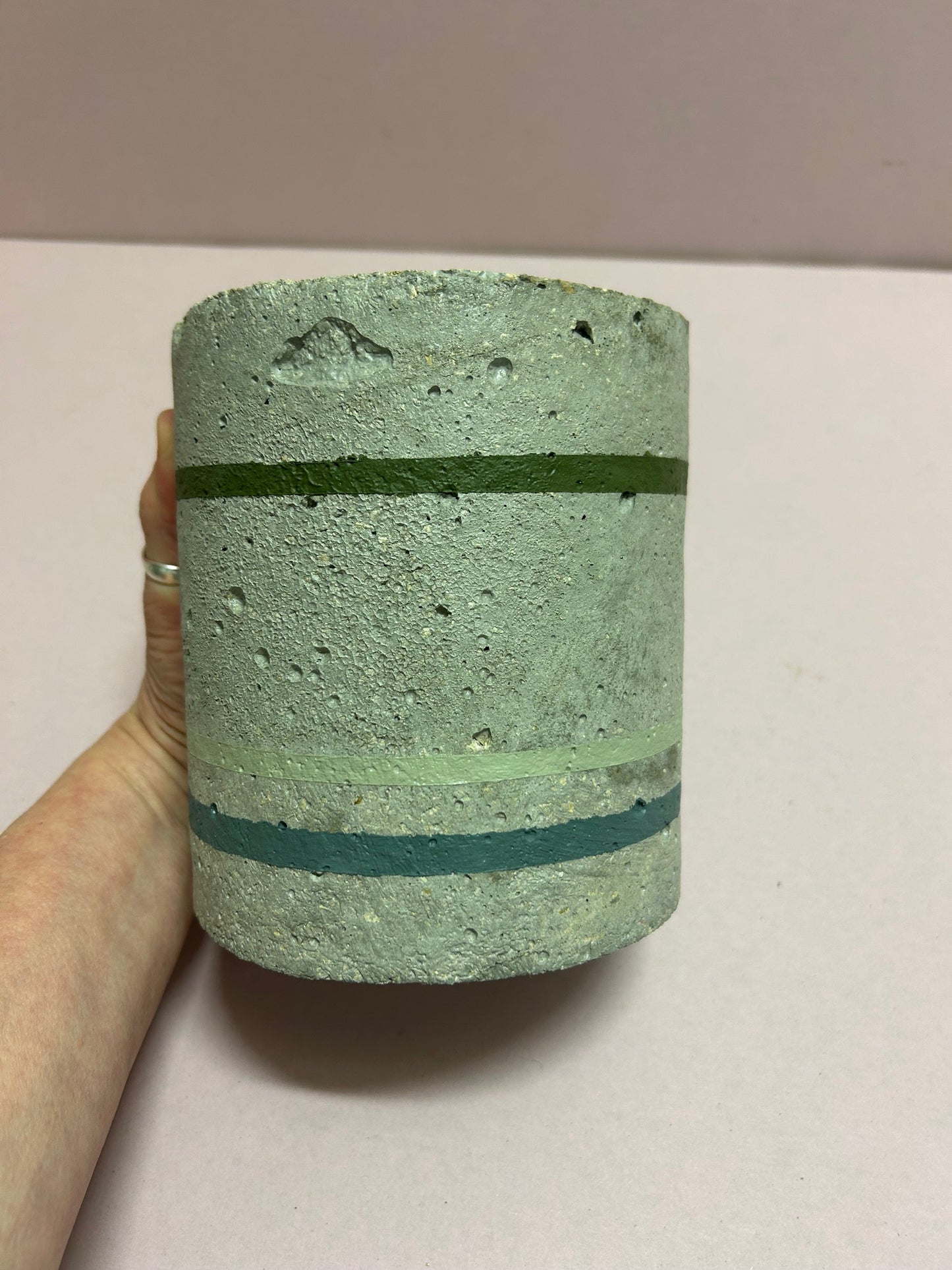 Cylinder pot with green stripes