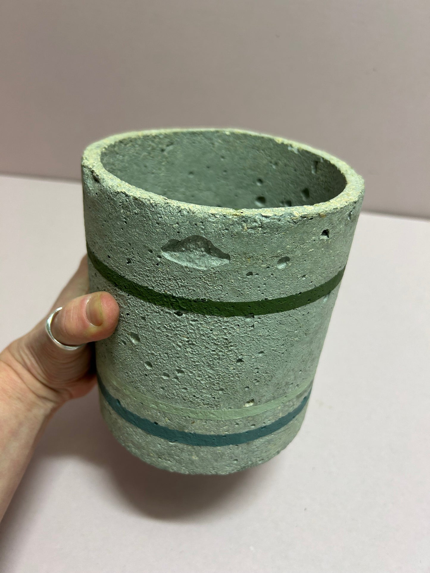 Cylinder pot with green stripes