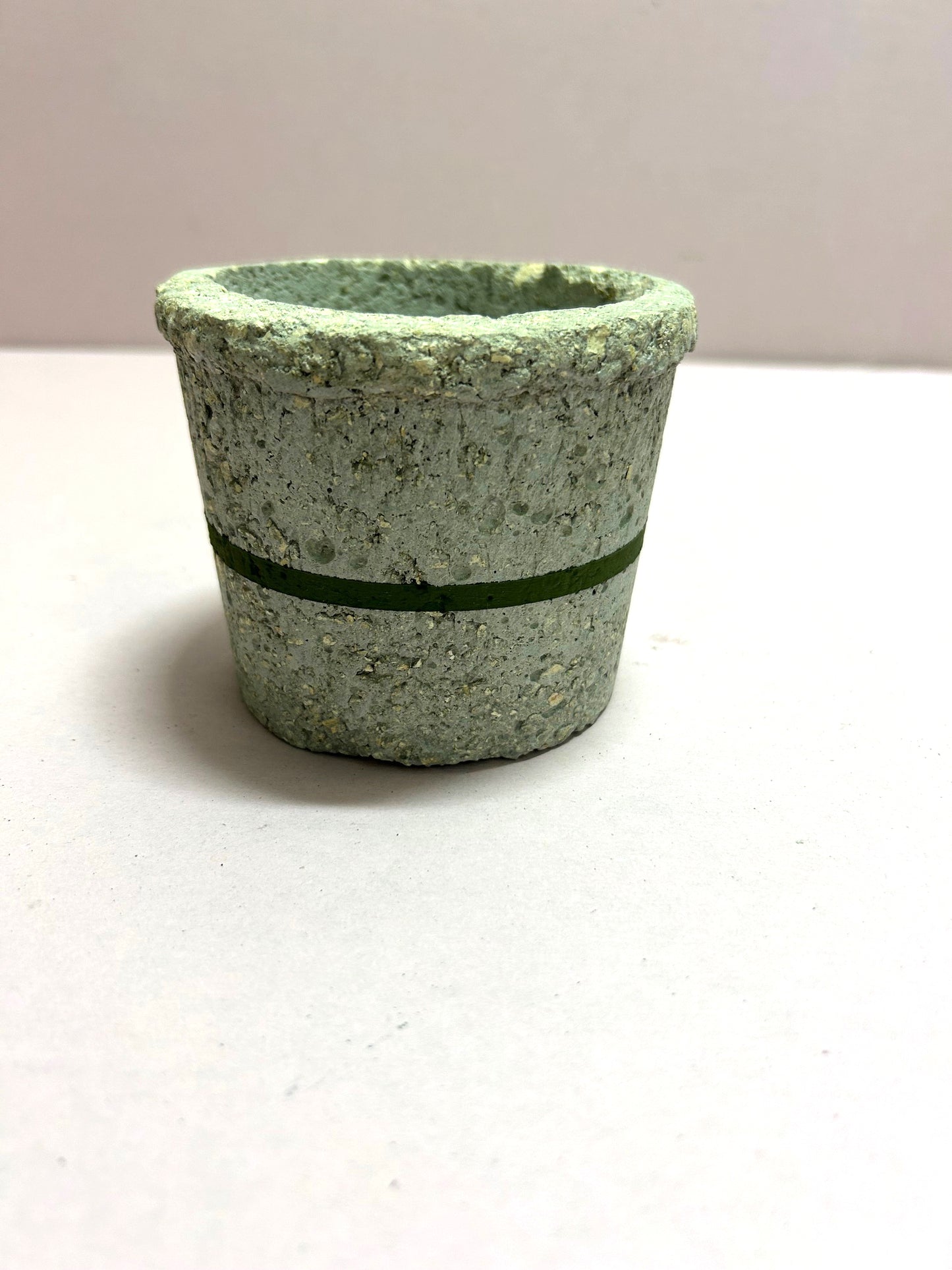 Small natural pot with green stripe