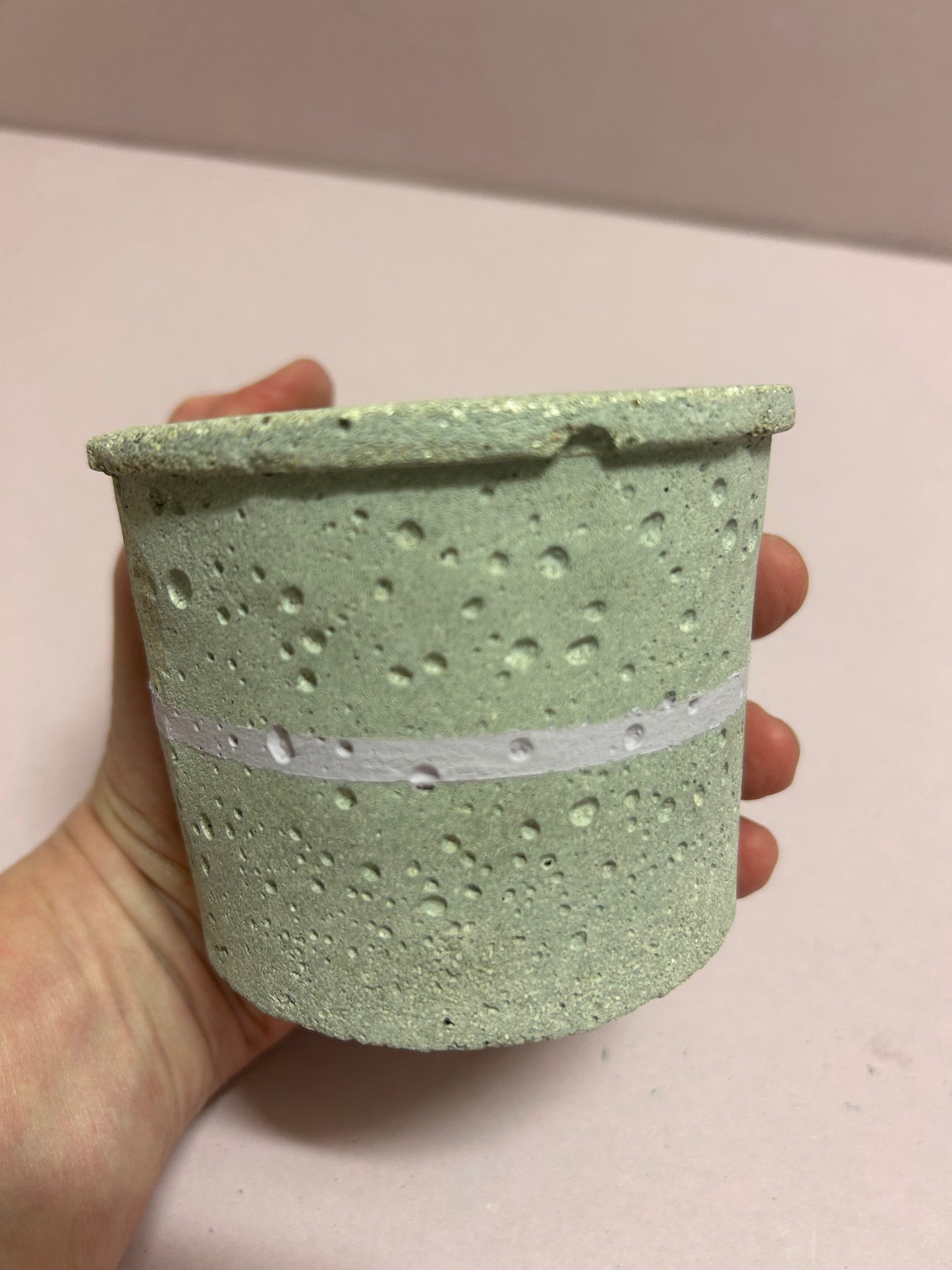 Small natural pot with pink stripe